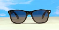 Kids classic wayfarer UV400 sunglasses in black with super dark lenses
