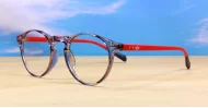 Round anti blue light glasses with silver accents, wire-core temples and steel hinges
