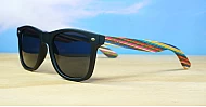 Skate unisex polarised sunglasses with matte black frames and bamboo arms with multi-coloured stripes