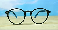 Large round anti blue light glasses with silver stud detail and flexible steel hinges