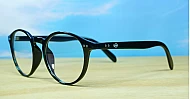 Large round anti blue light glasses with silver stud detail and flexible steel hinges