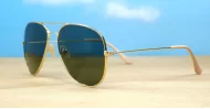 The Superdark Aviator UV400 sunglasses with sleek gold metal frames and dark glass lenses