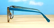 Subtle cat-eye TR90 anti blue light glasses in tortoise with clear or turquoise accents and wire-core temples