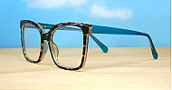 Subtle cat-eye TR90 anti blue light glasses in tortoise with clear or turquoise accents and wire-core temples