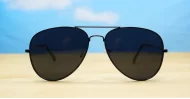 The Superdark Aviator UV400 sunglasses with sleek gold metal frames and dark glass lenses