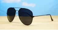 The Superdark Aviator UV400 sunglasses with sleek gold metal frames and dark glass lenses