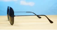 The Superdark Aviator UV400 sunglasses with sleek gold metal frames and dark glass lenses