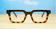 Sleek rectangular blue light glasses with silver detailing and robust steel hinges