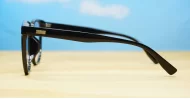 Shiny black square blue block glasses with silver detailing and robust steel hinges
