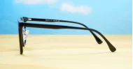 Round shiny black TR90 anti blue light glasses with gold detailing and steel hinges