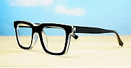 Rectangular blue blocker glasses with black to transparent fade frames and inner core wire temples