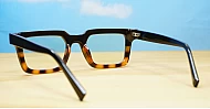 Sleek rectangular blue light glasses with silver detailing and robust steel hinges