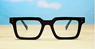 Sleek rectangular blue light glasses with silver detailing and robust steel hinges