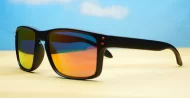 Tama red mirror revo polarised sunglasses curved wrap frame grey base lens