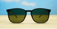 Rocket G15 round sunglasses with glossy black frames green G15 lenses and inner core wire temples