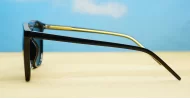 Rocket G15 round sunglasses with glossy black frames green G15 lenses and inner core wire temples
