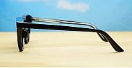 The Acorn small unisex vintage round UV400 sunglasses in shiny black with silver accents and dark lenses