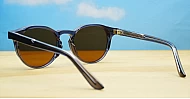 Classic tortoise round UV400 sunglasses with silver accents and dark brown lenses