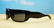 The Dasi male wrap-around UV400 sunglasses in shiny black with dark lenses