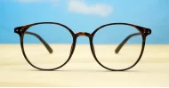 Round tortoise computer glasses with gold detailing and inner core wire temples