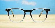 Black to clear fade blue light glasses with wire-core temples and steel hinges