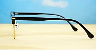 Black and gold clubmaster blue blocker glasses with vintage styling and steel hinges