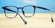 Crystal blue light glasses with translucent blue frame and steel hinges