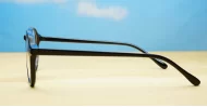 Round black blue block glasses with silver accents and steel hinges