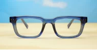 Clear blue blue blocker glasses with silver pin temple detailing
