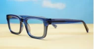 Clear blue blue blocker glasses with silver pin temple detailing
