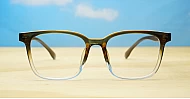 Brown and clear fade blue blocker glasses with silver temple detailing