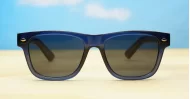 The Spike unisex vintage wayfarer UV400 sunglasses in translucent blue with black sides, gold pips and dark grey lenses
