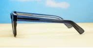 The Spike unisex vintage wayfarer UV400 sunglasses in translucent blue with black sides, gold pips and dark grey lenses