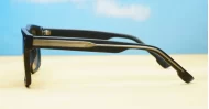 The Comet sporty black UV400 sunglasses for men with Oakley-inspired wrap frames and brown Category 3 lenses