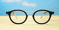Round black and clear two-tone computer glasses with silver pin temple detailing