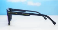 Stride sunglasses with blue mirror lenses matte black frames and coloured pinstripe temples