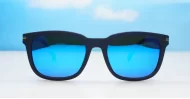Stride sunglasses with blue mirror lenses matte black frames and coloured pinstripe temples