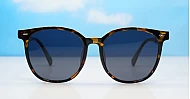 Large round women's polarised sunglasses in TR frames — Sloan by iPOP
