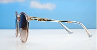 The Ruby oversized round UV400 sunglasses with gold metal temples and gradient lenses