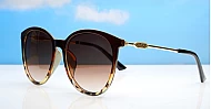 The Ruby oversized round UV400 sunglasses with gold metal temples and gradient lenses