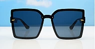 The Romy large square UV400 sunglasses with textured temples and gold detailing