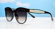 The Daylight elegant round UV400 sunglasses for women with silver temple detail and super dark lenses