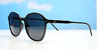 The Disco large round UV400 sunglasses in black with gold detailing and super dark lenses