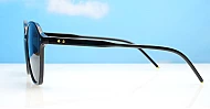 The Disco large round UV400 sunglasses in black with gold detailing and super dark lenses