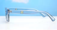 The Amos small retro rectangular UV400 sunglasses for women with super dark lenses and gold arm detailing