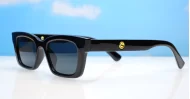 The Amos small retro rectangular UV400 sunglasses for women with super dark lenses and gold arm detailing