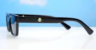 The Amos small retro rectangular UV400 sunglasses for women with super dark lenses and gold arm detailing