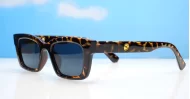 The Amos small retro rectangular UV400 sunglasses for women with super dark lenses and gold arm detailing