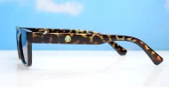 The Amos small retro rectangular UV400 sunglasses for women with super dark lenses and gold arm detailing