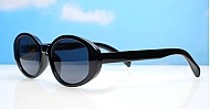 The Freya medium retro oval UV400 sunglasses in translucent or solid colours with super dark lenses